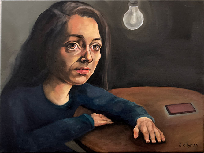 Woman lit with a single lightbulb and a glowing phone just out of reach