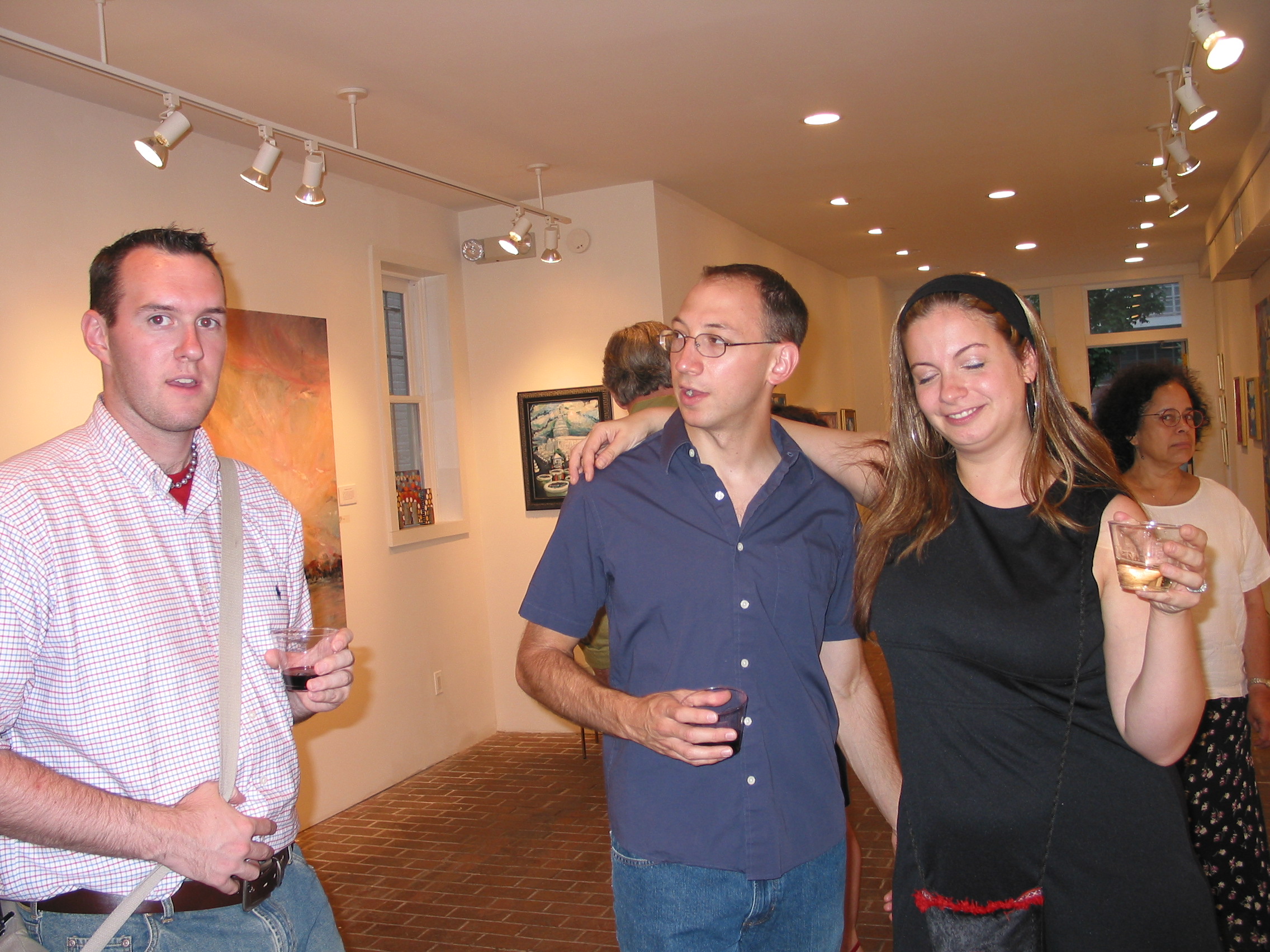 Guests conversing at the Gallery 325 opening reception, 2002