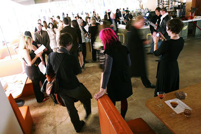 Crowd at the LadyFest DC gallery opening, 2002