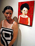 Dana Ellyn standing beside her painting Waiting for Peter Pan at LadyFest DC, 2002