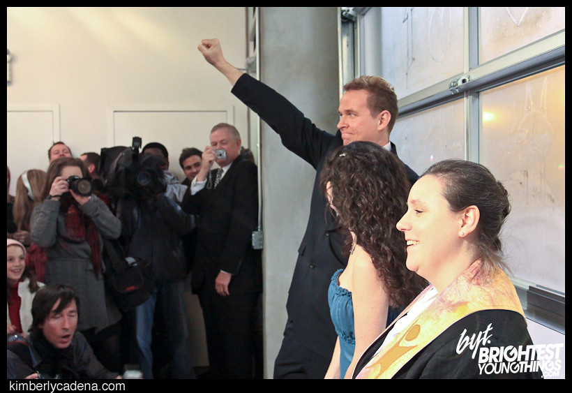 Matt raises a fist during the ceremony