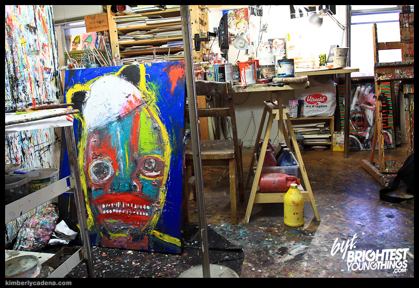 Paintings and supplies in the studio