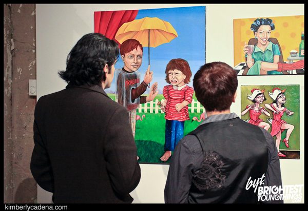 Guests looking at paintings