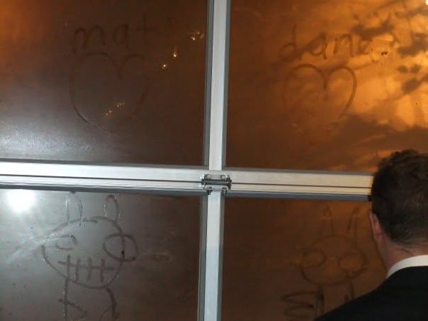 Dana Ellyn and Matt Sesow's wedding, Long View Gallery, 2010: Hearts drawn in the fog on the gallery window