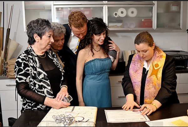 Dana Ellyn and Matt Sesow's wedding at Long View Gallery, 2010: Signing the marriage certificate
