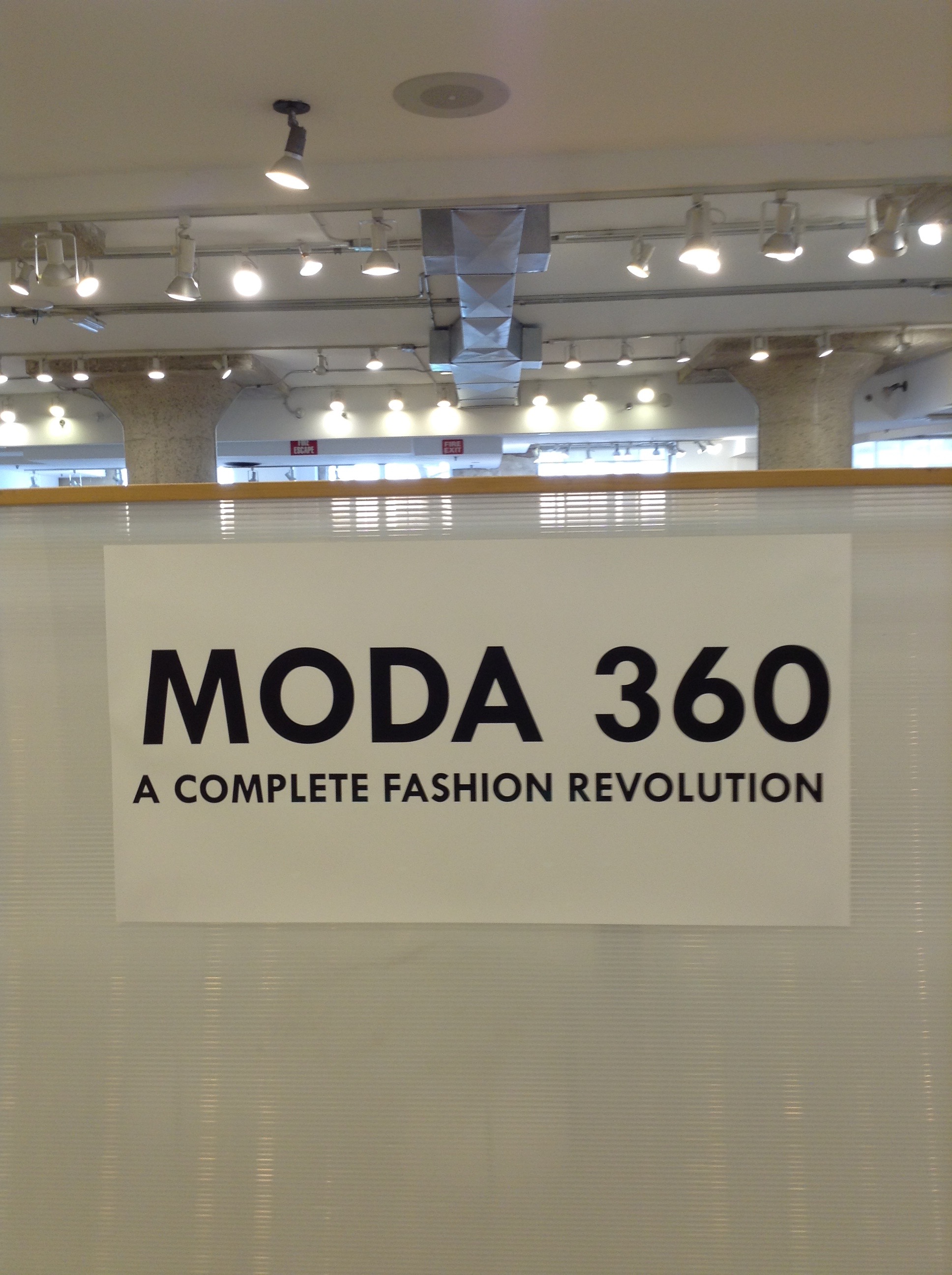Moda 360 A Complete Fashion Revolution sign in the exhibit hall