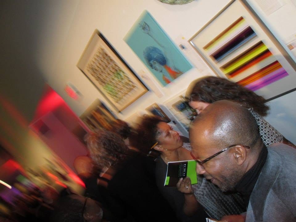 Bidding at Angela, 11th annual Transformer auction, Katzen Arts Center, 2014