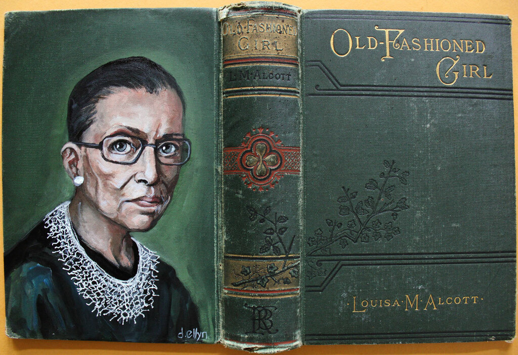 Portrait of Ruth Bader Ginsburg painted on the cover of Louisa M. Alcott’s Old-Fashioned Girl