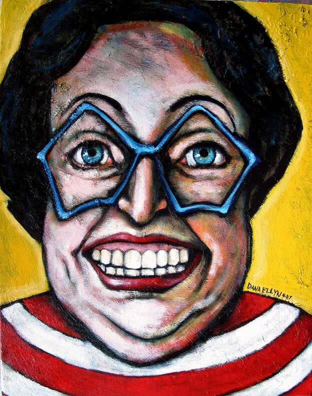 Portrait of a smiling woman in blue star-shaped glasses and a red-and-white striped shirt