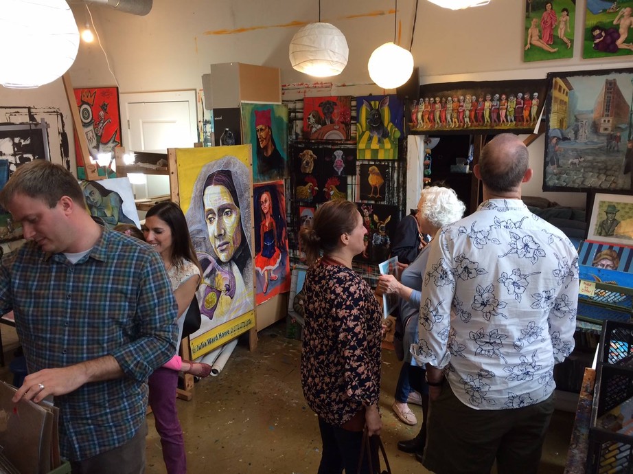 Visitors browsing paintings inside the Sesow and Ellyn studio at Mather Studios